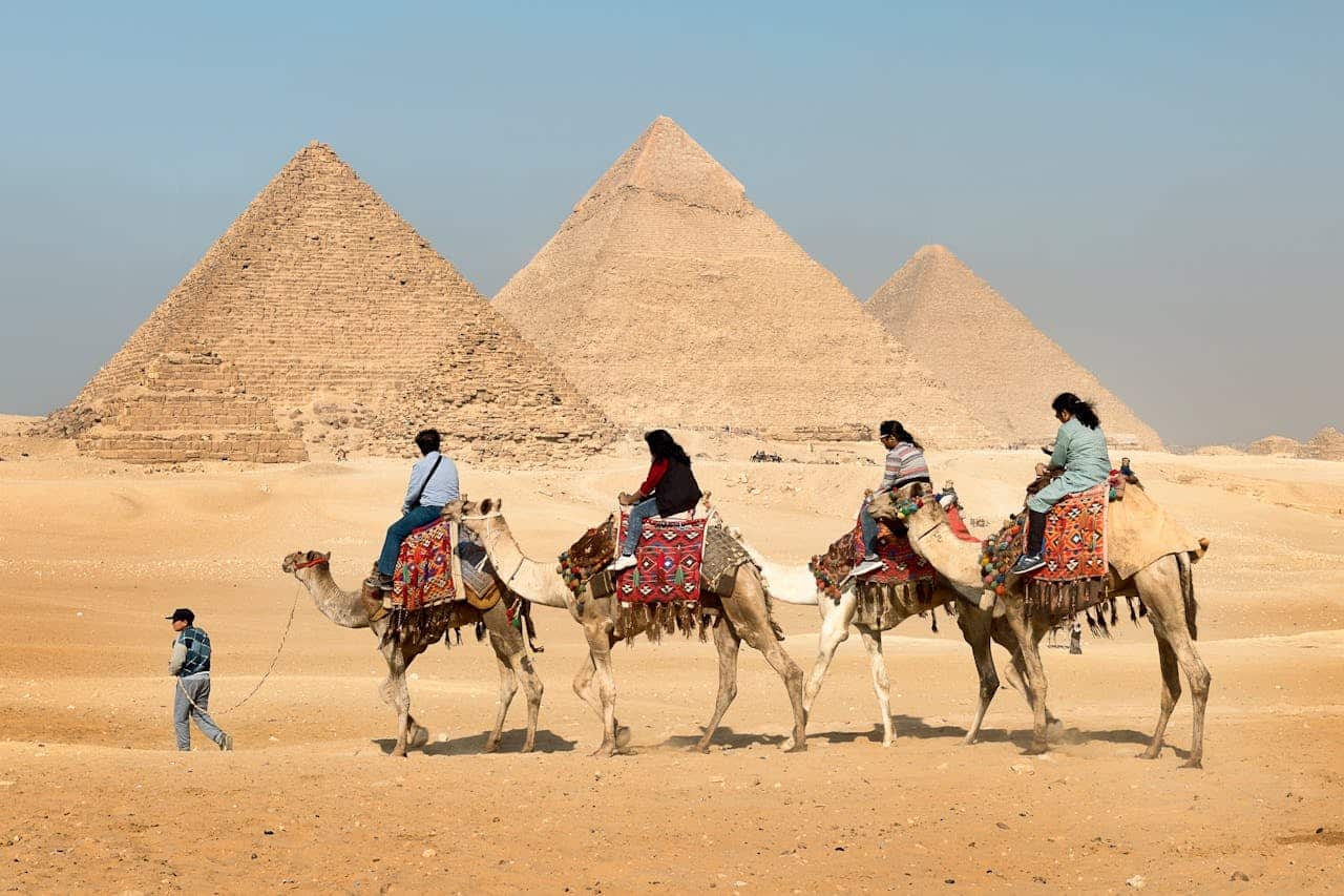 riding camel in pyramids